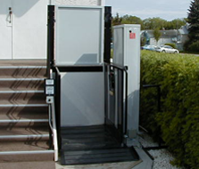 commercial accessible wheelchair platform lift installed in an open space